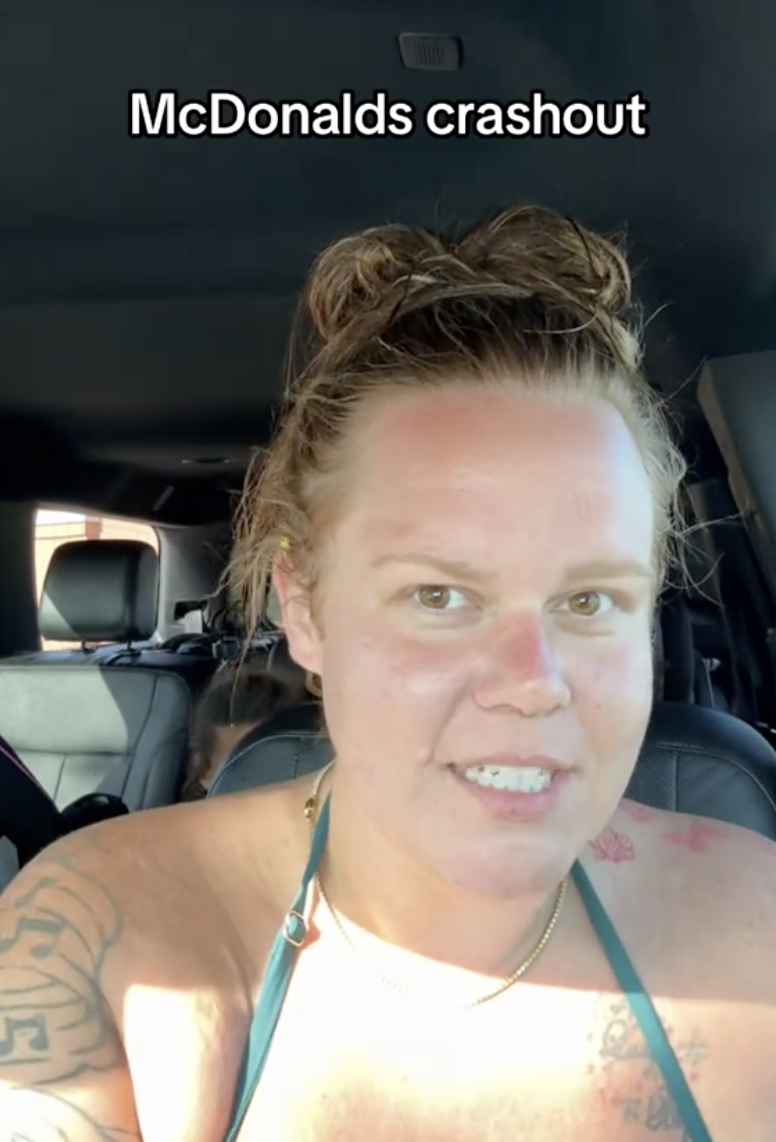 woman talking in her car